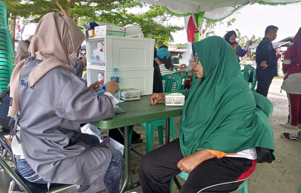 Hadir di Pesta Rakyat Teluk Rubiah, Mobil Sehat PT Timah Tbk Diserbu Warga