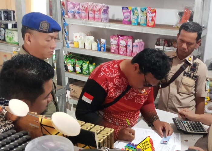 Belasan Botol Arak Diamankan dari Penjual di Desa Pohin