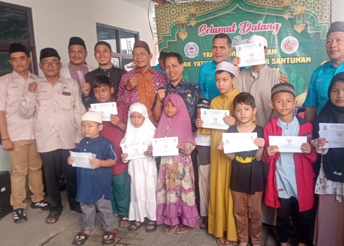 Asisten III Pemkot Apreiasi LPM dan Karang Taruna Air Itam Berbagi ke 53 Yatim Piatu