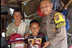 Aksi Humanis Bhabinkamtibmas Polsek Bukit Intan, Bantu Seragam Sekolah Bocah Kurang Mampu