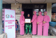 Bhayangkari Ranting Payung Berbagi Ke Masyarakat