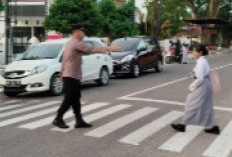 Kapolsek Taman Sari Pimpin Strong Point Pagi di Depan SMKN 1 Pangkalpinang