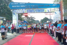 Ribuan Runners Jajal Rute Pantai Basel Bareng Pemegang Rekor Marathon Indonesia